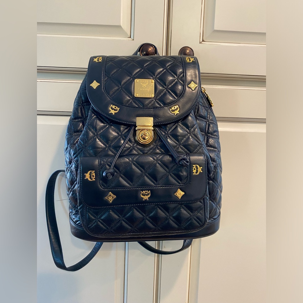 Mcm Black Backpack With Gold Hardware Comes With The Dust Bag
